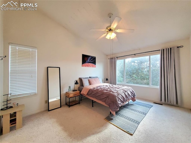 carpeted bedroom featuring lofted ceiling and ceiling fan