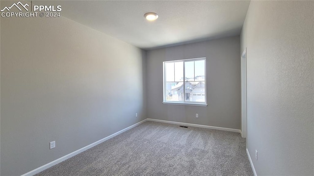 view of carpeted empty room