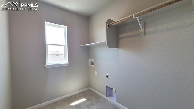 laundry room featuring hookup for a washing machine and electric dryer hookup