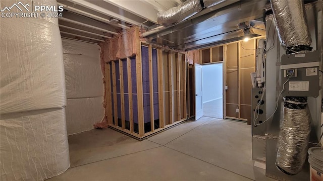 basement featuring heating unit