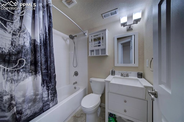 full bathroom with shower / bath combination with curtain, a textured ceiling, vanity, and toilet