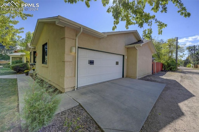 view of home's exterior with a garage