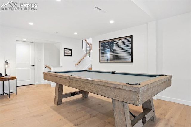 recreation room with light hardwood / wood-style floors and billiards