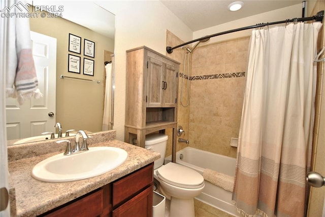 full bathroom featuring tile patterned floors, vanity, shower / tub combo, and toilet