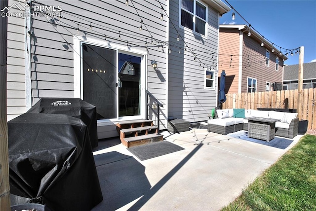 view of patio featuring outdoor lounge area and a grill