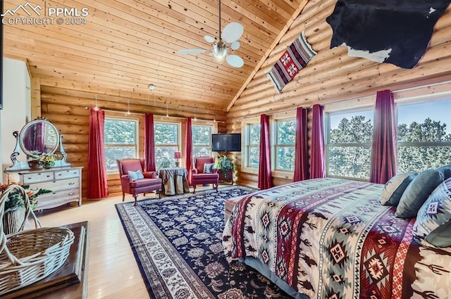 9 Arapahoe St, Woodland Park, CO 80863 - bedroom with rustic walls, wood-type flooring, wooden ceiling, and high vaulted ceiling