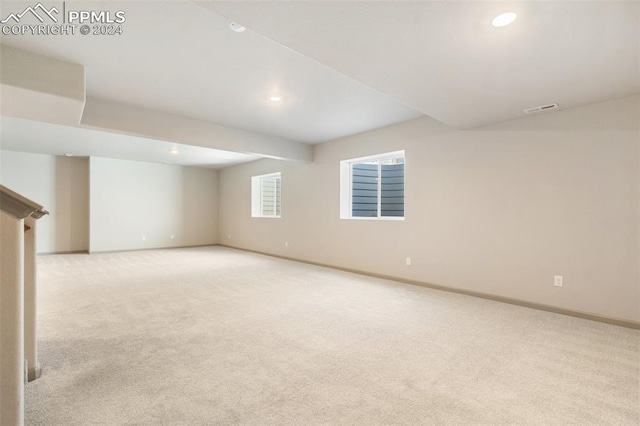 basement with light carpet