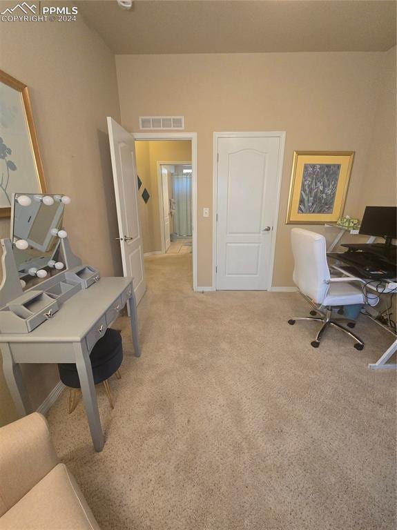 home office featuring light colored carpet