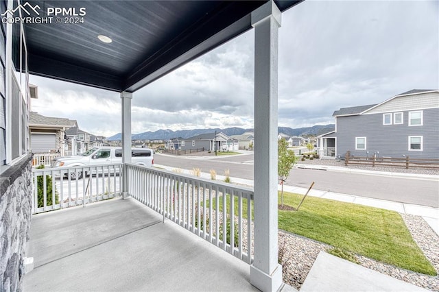 balcony featuring a mountain view