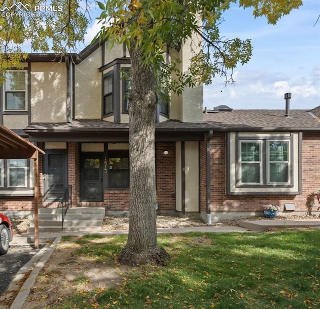 view of front of home with a front yard