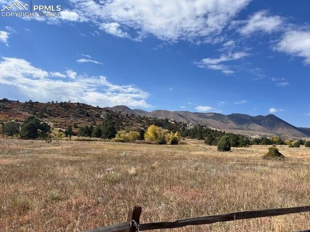 view of mountain feature featuring a rural view