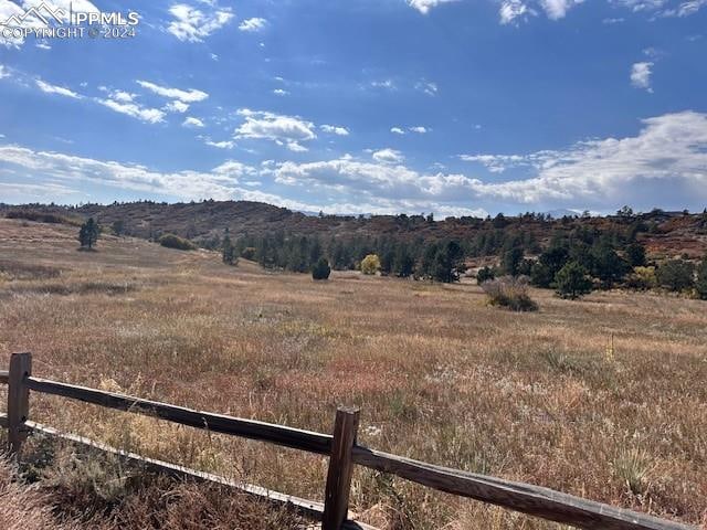 property view of mountains with a rural view