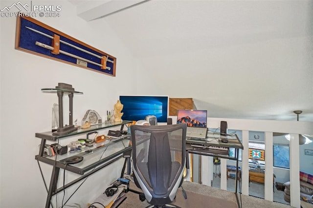 carpeted home office with vaulted ceiling with beams