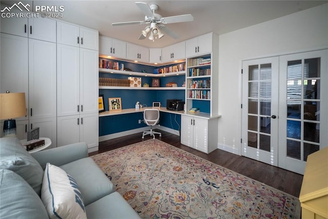 office with ceiling fan, built in desk, dark wood-type flooring, and french doors