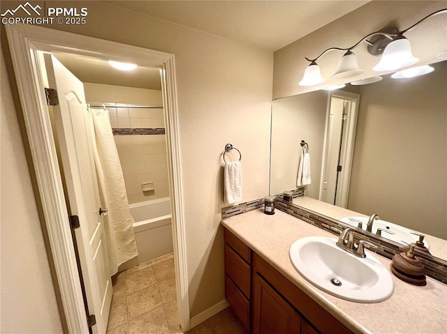 bathroom with vanity and shower / bath combo