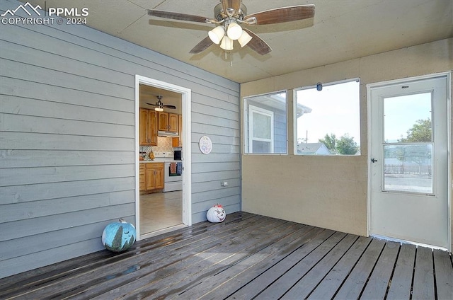 unfurnished sunroom featuring plenty of natural light