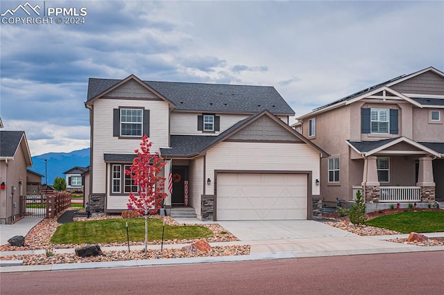 craftsman house with a garage