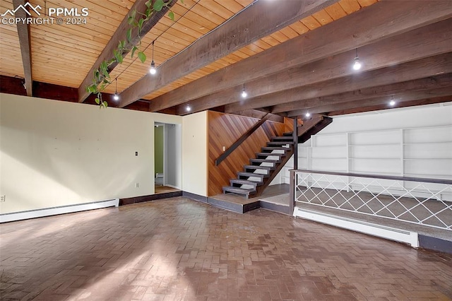 basement with built in shelves, a baseboard radiator, and wood ceiling