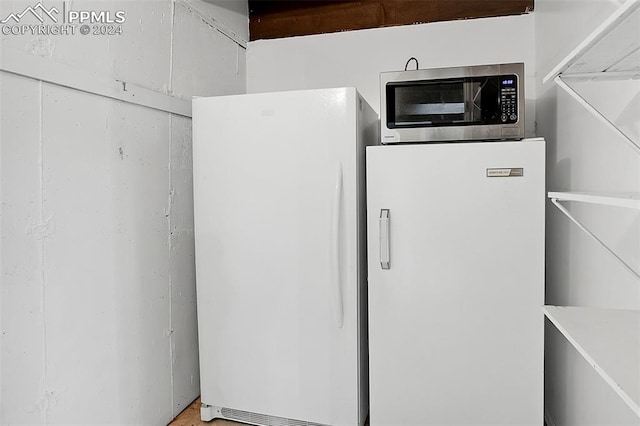 interior space with white refrigerator