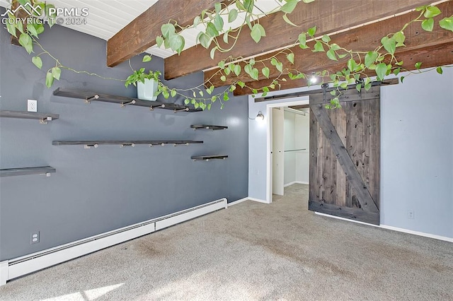 interior space featuring carpet flooring, baseboard heating, a barn door, and beam ceiling