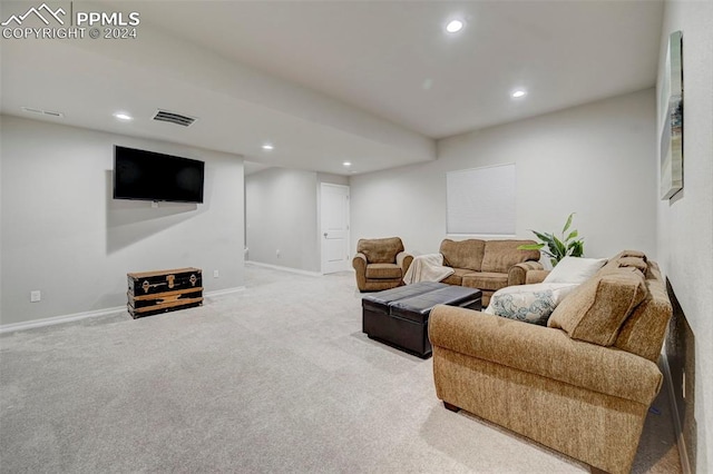 living room featuring light carpet