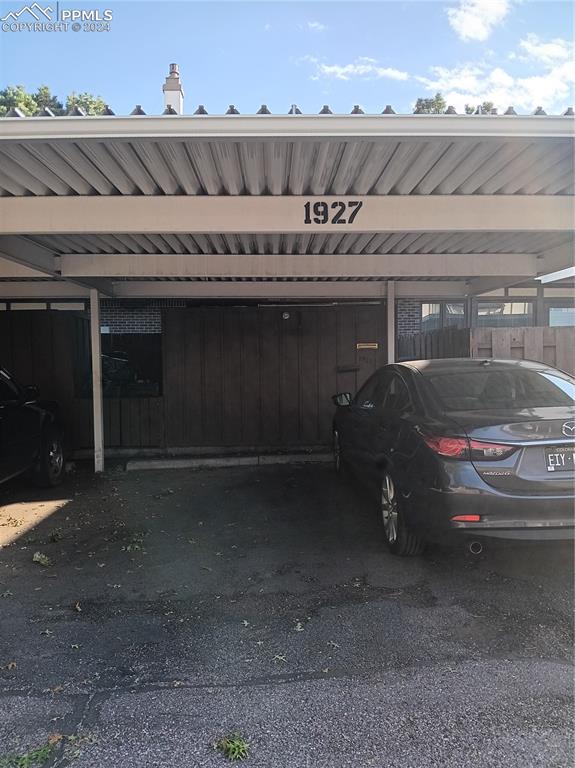 view of car parking with a carport