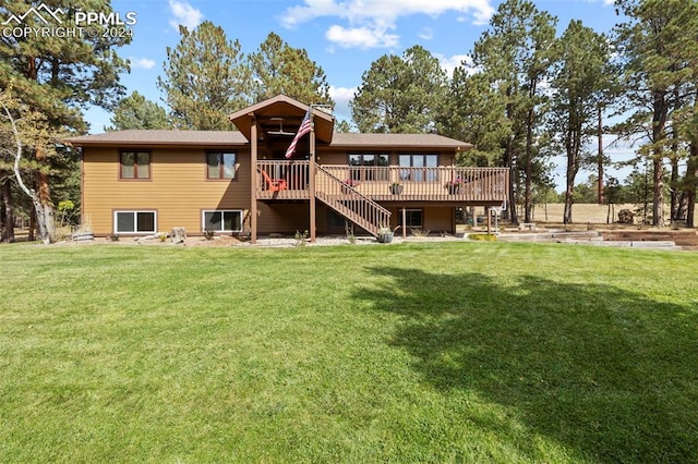 10760 Hardy Rd, Colorado Springs, CO 80908 - rear view of property with a wooden deck, a yard, a chimney, and stairs