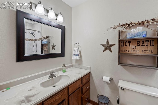 10760 Hardy Rd, Colorado Springs, CO 80908 - bathroom with vanity and toilet
