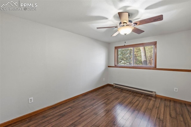 10760 Hardy Rd, Colorado Springs, CO 80908 - spare room featuring a baseboard heating unit, wood finished floors, baseboards, and ceiling fan