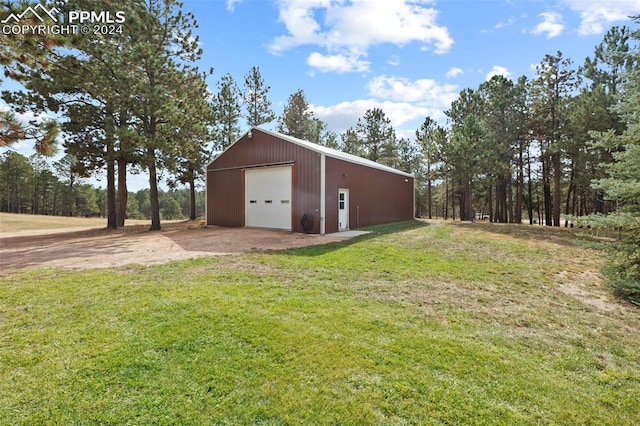 10760 Hardy Rd, Colorado Springs, CO 80908 - exterior space with driveway and an outbuilding
