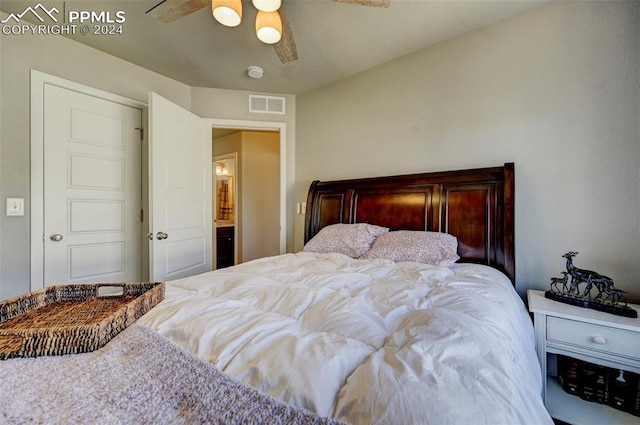 bedroom with connected bathroom and ceiling fan