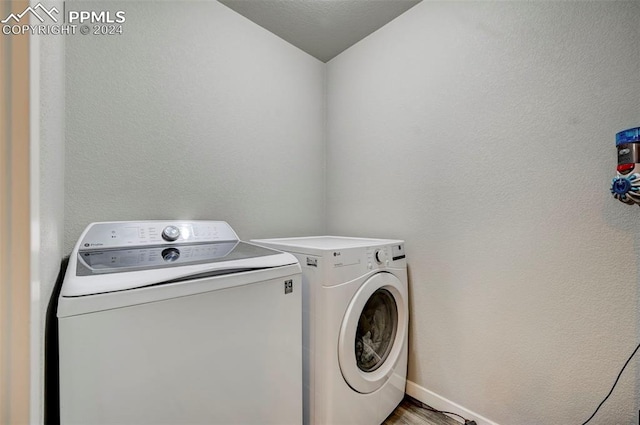 laundry room with washer and dryer