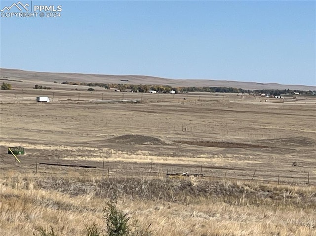 exterior space with a rural view