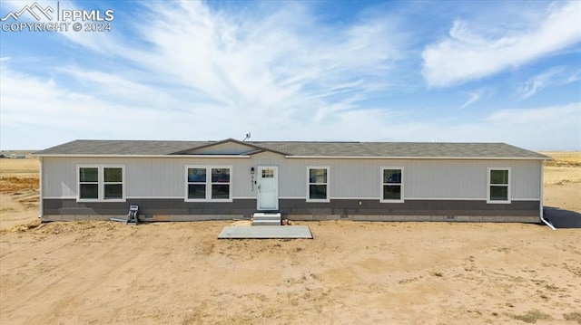 6652 Middlefield Ct, Colorado Springs, CO 80928 - rear view of property featuring crawl space and a shingled roof