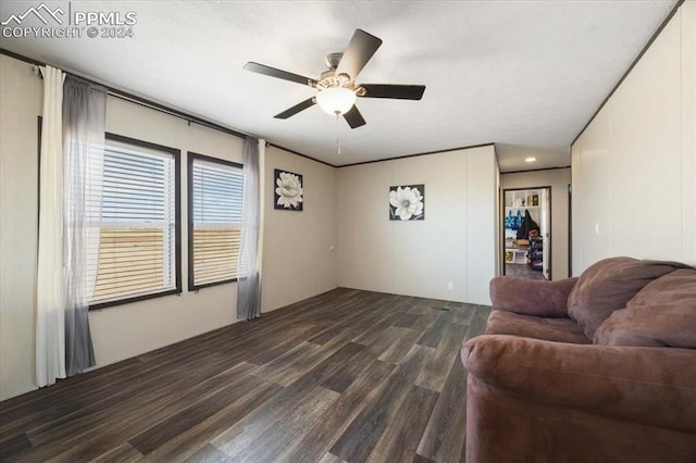 6652 Middlefield Ct, Colorado Springs, CO 80928 - living area featuring dark wood finished floors and ceiling fan