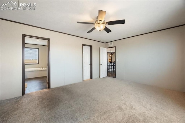 6652 Middlefield Ct, Colorado Springs, CO 80928 - unfurnished bedroom featuring carpet flooring, ornamental molding, ensuite bathroom, and ceiling fan