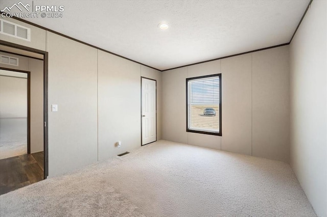 6652 Middlefield Ct, Colorado Springs, CO 80928 - unfurnished bedroom featuring carpet and crown molding