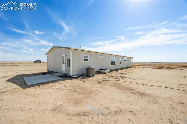 6652 Middlefield Ct, Colorado Springs, CO 80928 - back of property with central AC unit