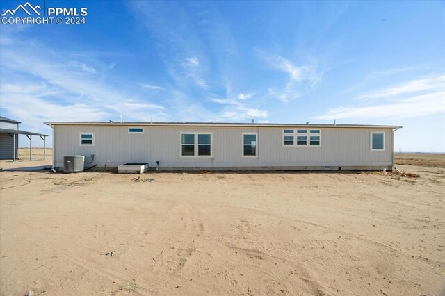 6652 Middlefield Ct, Colorado Springs, CO 80928 - rear view of house with central AC unit