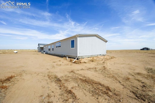 6652 Middlefield Ct, Colorado Springs, CO 80928 - view of side of property featuring a view of rural / pastoral area