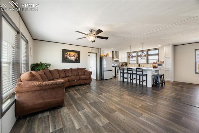 6652 Middlefield Ct, Colorado Springs, CO 80928 - living room with dark wood-style flooring and a ceiling fan