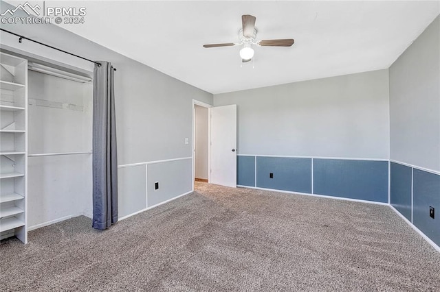 unfurnished bedroom featuring carpet and ceiling fan