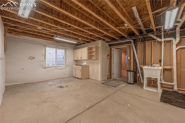 basement featuring sink