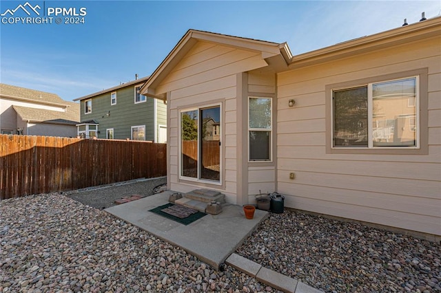 rear view of house featuring a patio