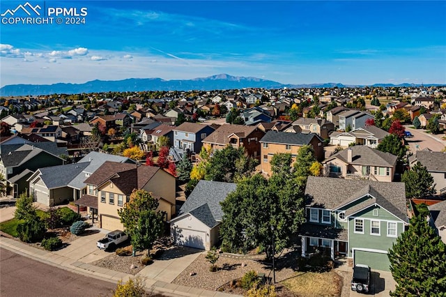 drone / aerial view featuring a mountain view