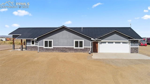 craftsman house with a garage