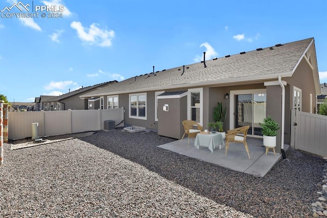 back of property featuring a patio and central AC unit