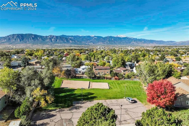 birds eye view of property featuring a mountain view