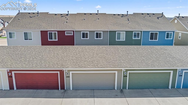 garage featuring driveway