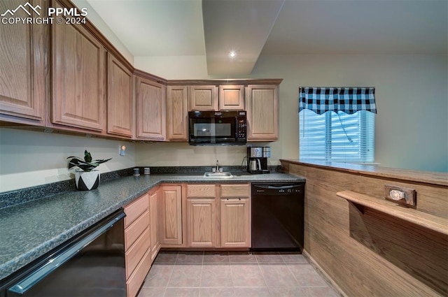 kitchen with sink, light tile patterned floors, and black appliances